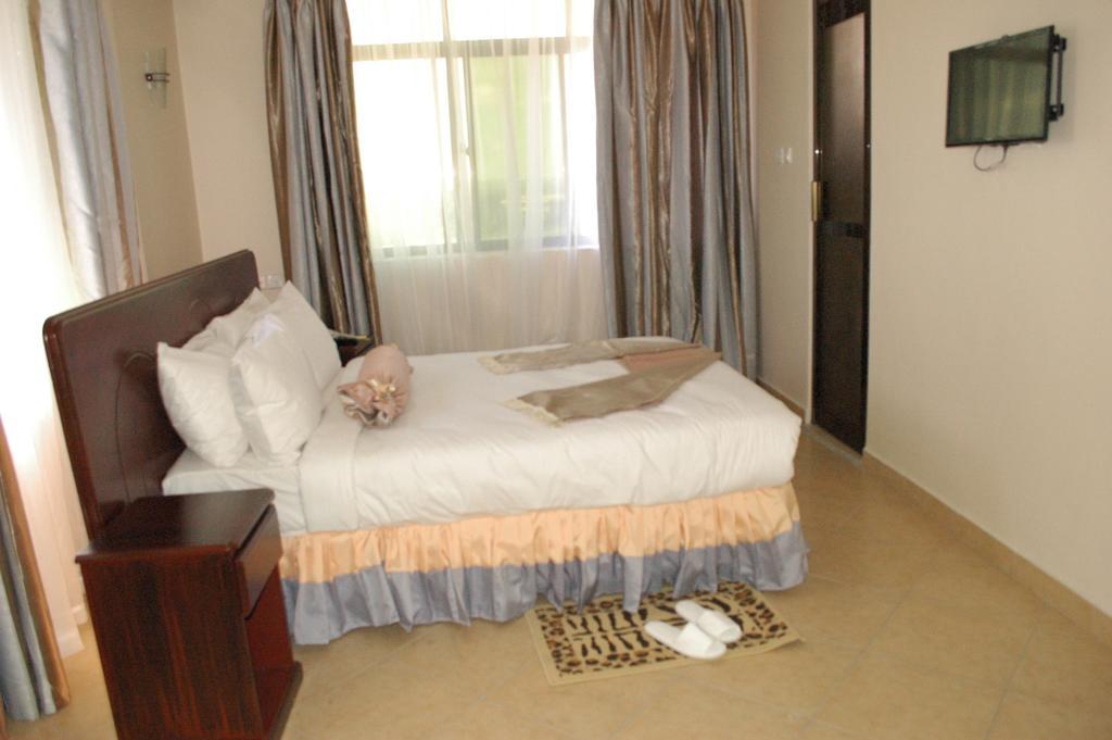 Grace Land Hotel Arusha Pokoj fotografie